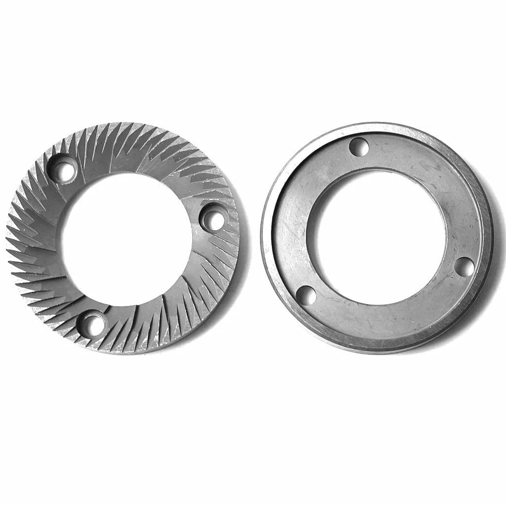 The MC..11 Fiorenzato Grinding Burrs (Pair) are displayed side by side on a white background; the left burr has angled cutting teeth, and the right is smooth with three holes. © 2025 1st-line.com