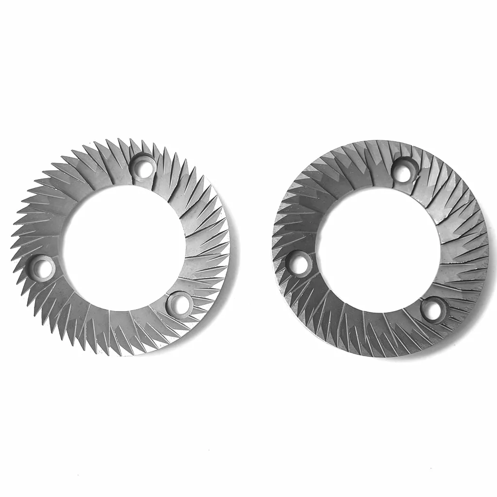 Two MC..18 MAZZER GRINDING BURR BLADES, each round with sharp angled teeth and three mounting holes, are positioned side by side on a white background. © 2025 1st-line.com