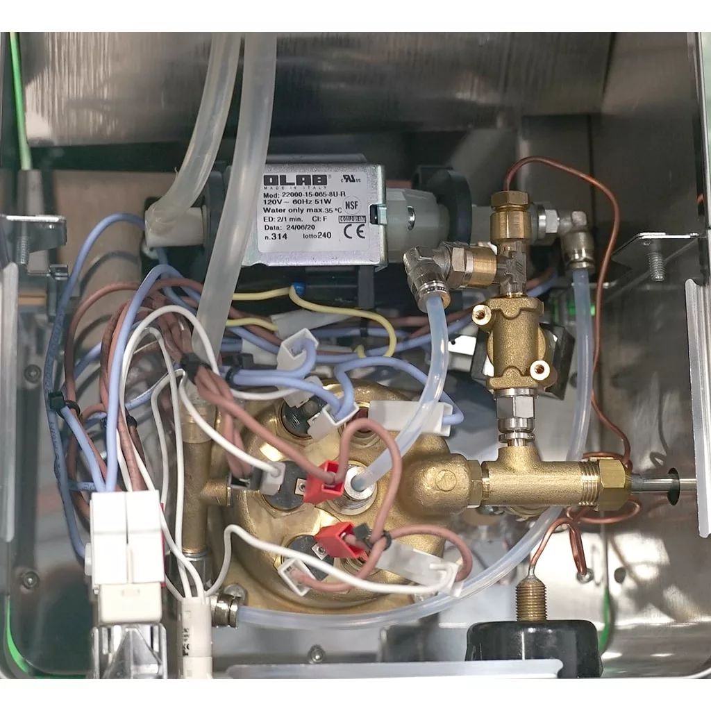 Close-up view of the inside of a PL41EM machine showing various wires, tubes, and brass valves connected to a solenoid valve labeled OLAB. The components and top panel wiring are neatly arranged within a metallic enclosure. © 2025 1st-line.com