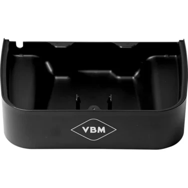 The VBM CARRCASDJDSNW Domobar Super/Junior Tray is a black rectangular plastic tray with raised sides and a VBM logo on the front, designed to fit Domobar Junior and Domobar Super machines, viewed from above. © 2025 1st-line.com