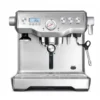 The Breville Dual Boiler™ Espresso Machine features stainless steel construction, LCD display, pressure gauge, knobs, and steam wand—perfect for crafting barista-quality espresso and cappuccino drinks at home. © 2025 1st-line.com