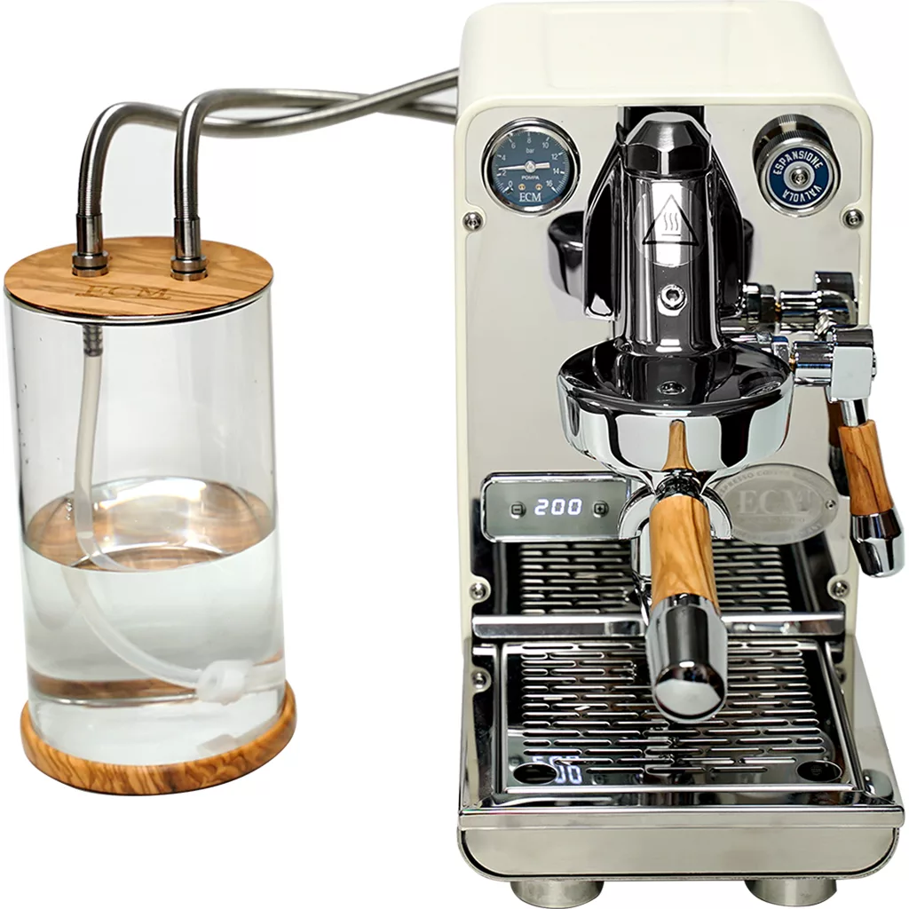 The DISCONTINUED ECM Puristika Espresso Machine features stainless steel and wood accents, a clear water reservoir with a wooden lid connected by two tubes, digital display, and metal drip tray. © 2025 1st-line.com