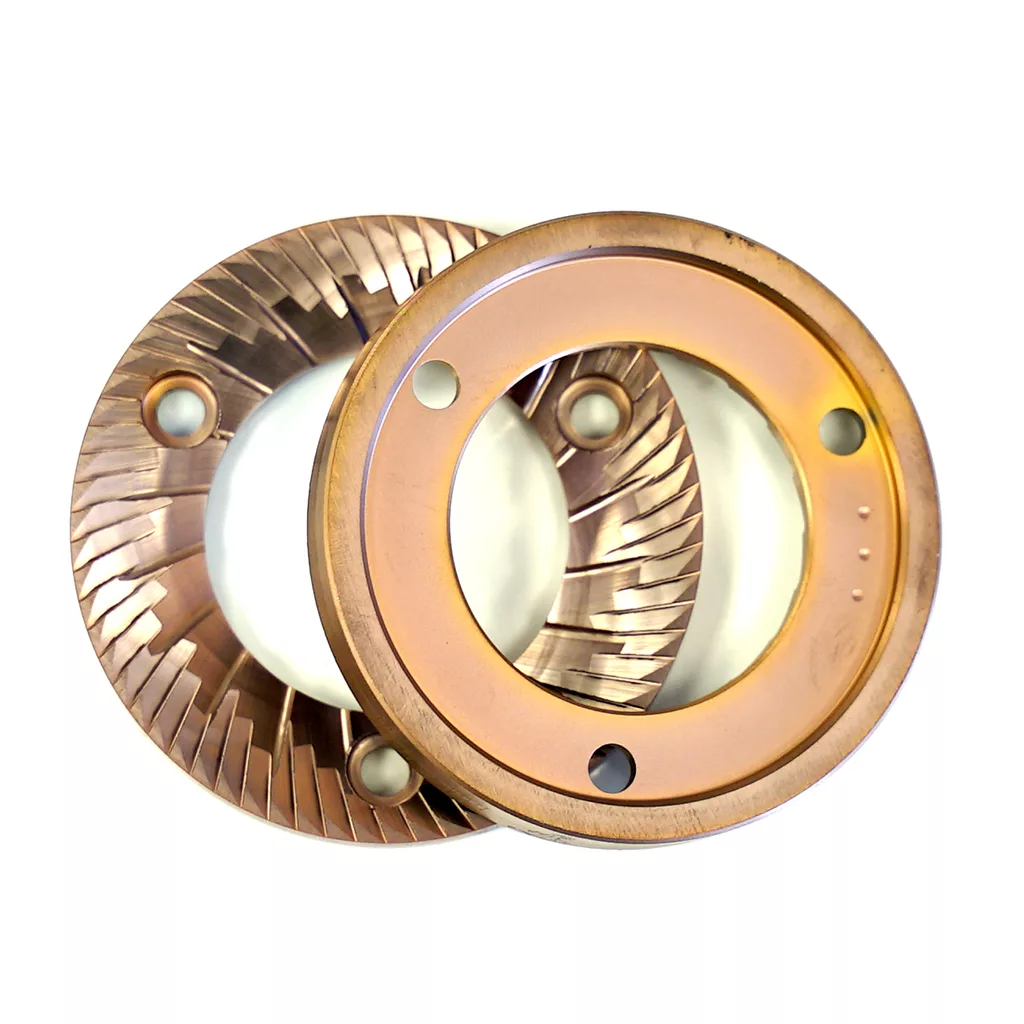 The Fiorenzato MP64HR002/R All Ground 64mm Burr Set with Shims features two circular metal burrs, each with spiral grooves and three holes—perfect for espresso or brew grinding, shown overlapping on a white background. © 2025 1st-line.com