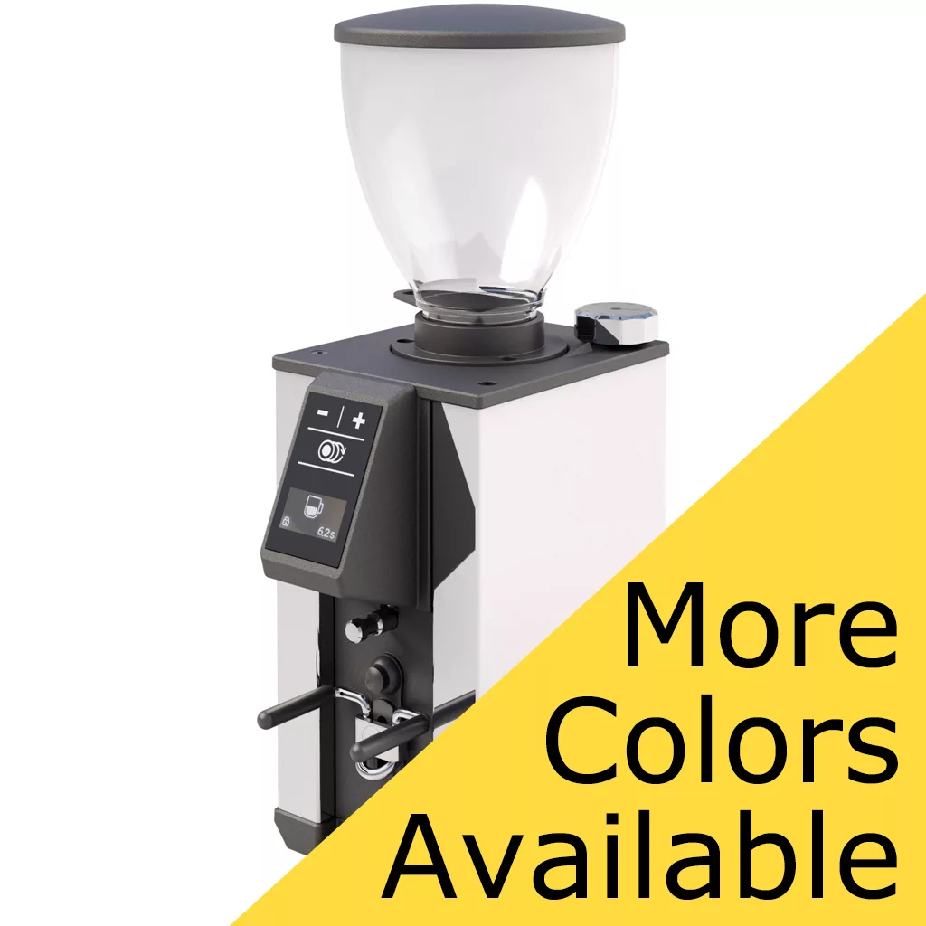 The Macap Leo 55 Espresso Coffee Grinder features a transparent bean hopper and digital display, shown in white. A yellow corner banner states “More Colors Available.”. © 2025 1st-line.com