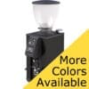 The Macap Leo 55 Essential Espresso Coffee Grinder has a digital control panel, a transparent bean hopper, and a sleek black base. A yellow diagonal banner says More Colors Available. © 2025 1st-line.com