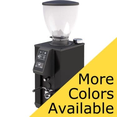 The Macap Leo 55 Essential Espresso Coffee Grinder has a digital control panel, a transparent bean hopper, and a sleek black base. A yellow diagonal banner says More Colors Available. © 2025 1st-line.com