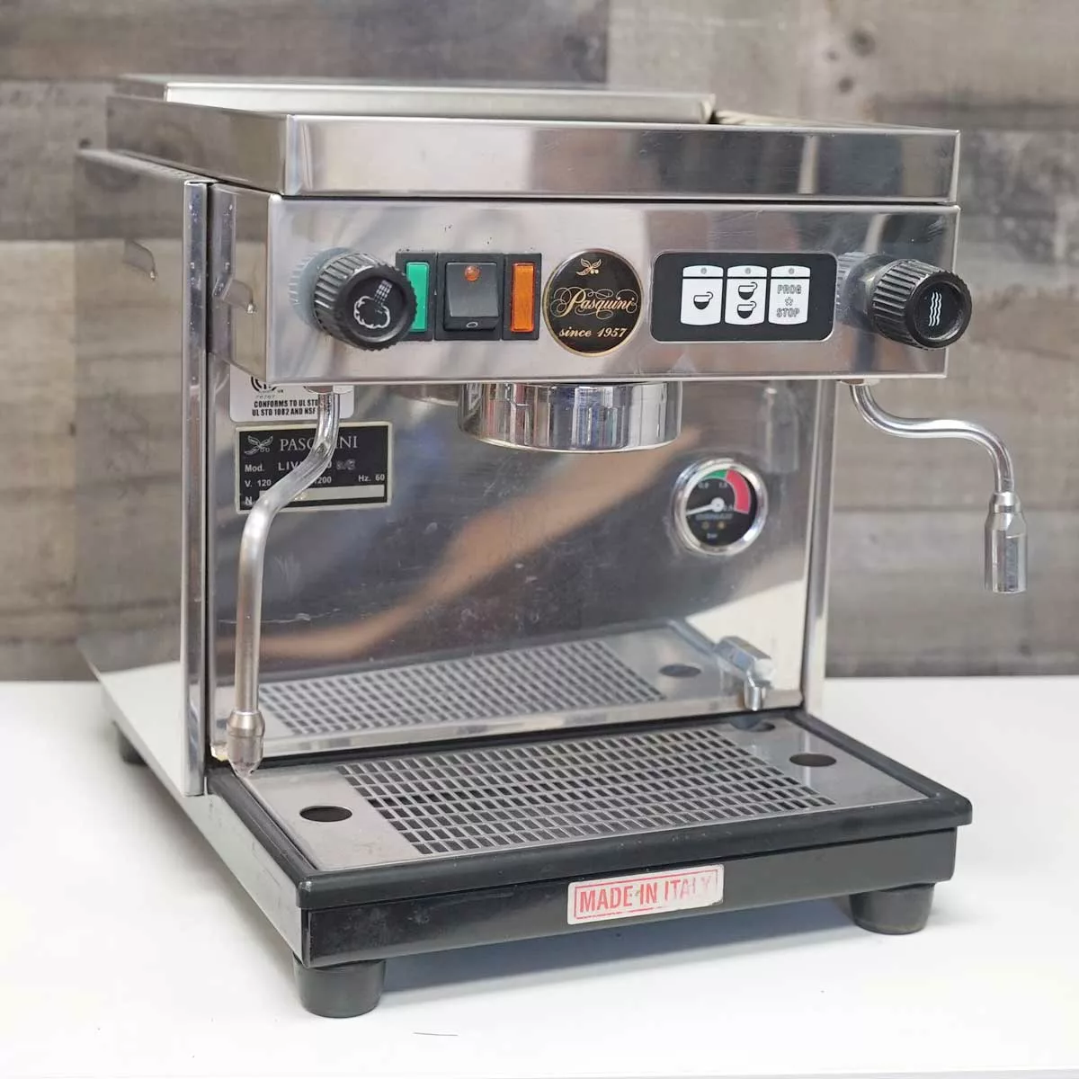 A SIDEWALK SALE - Pasquini Livia 90 Electronic Espresso Machine USED (E113) with control knobs, buttons, steam wand, and pressure gauge sits on a white counter. Made in Italy is visible on the front; machine is in great condition. © 2025 1st-line.com