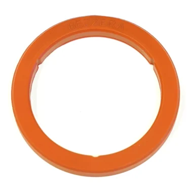 The Bezzera 7493022 Portafilter / Grouphead Gasket is an orange, circular silicone gasket with BEZZERA embossed on top, a smooth surface, and a small inner notch. © 2025 1st-line.com