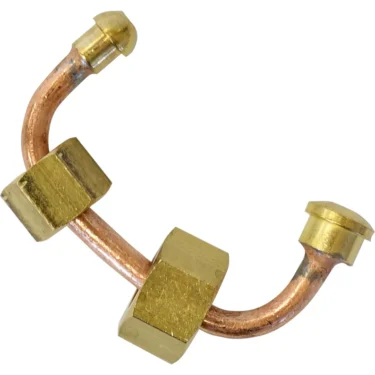 A close-up of the VBM TUBIP988 Pipe from Valve to Wand, featuring a curved copper pipe with two brass hexagonal fittings—perfect for connecting the valve to the wand. © 2025 1st-line.com