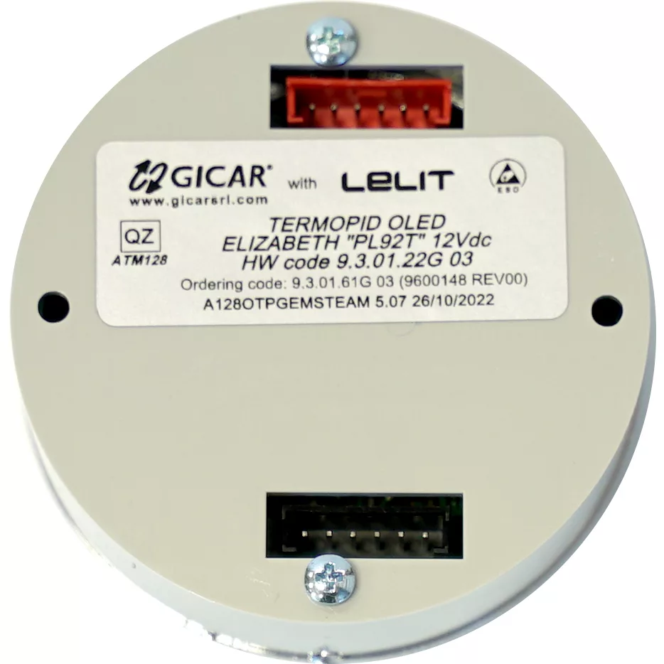 A round electronic component labeled GICAR and Lelit 9600148 Elizabeth LCC Display - V3, featuring a barcode, connectors, technical specs, and manufacturing info on its face. © 2025 1st-line.com