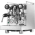 A stainless steel Rocket Mozzafiato Cronometro Type V espresso machine with multiple dials, levers, and a steam wand, reflecting a modern, professional design. The front displays pressure gauges and the Rocket Espresso logo. © 2025 1st-line.com