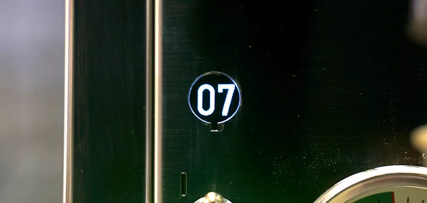 Close-up of a digital display showing the number 07 in white on a dark background, likely part of a machine or electronic device. © 2025 1st-line.com