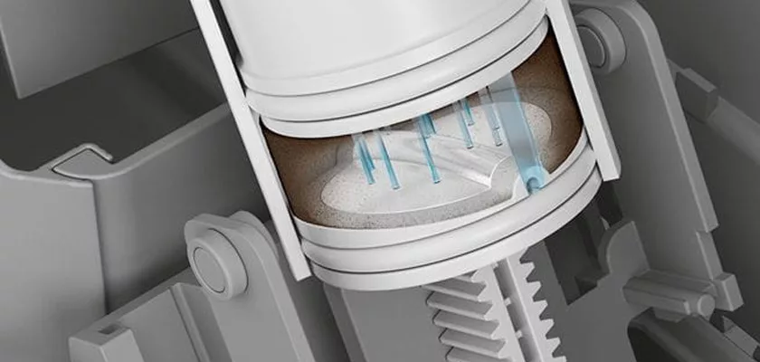 A close-up, cross-sectional view of a piston inside an engine cylinder, evoking the precise engineering of the Jura Z10 Super-Automatic Espresso Machine, depicted in a gray technical illustration style. © 2025 1st-line.com