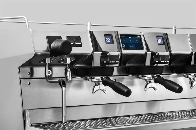 A close-up of the Rancilio Invicta 2 Group Commercial Espresso Machine showcases its stainless steel build, black accents, digital displays, and steam wands—ideal for advanced commercial espresso needs. © 2025 1st-line.com