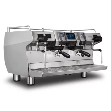 The Rancilio Invicta is a commercial espresso machine with 2 group heads, digital displays, steam wands, and a drip tray, designed for professional coffee preparation. © 2025 1st-line.com