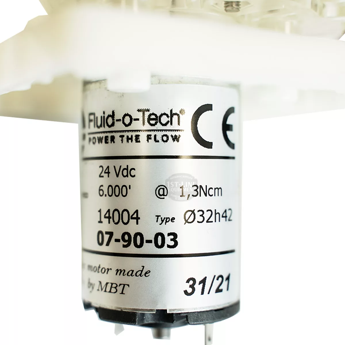 Close-up of a Bezzera 7730512 Pump label displays specs: 24 Vdc, 6.000°, 1.3 Ncm, Type Ø32h42, plus product codes and CE certification. © 2025 1st-line.com