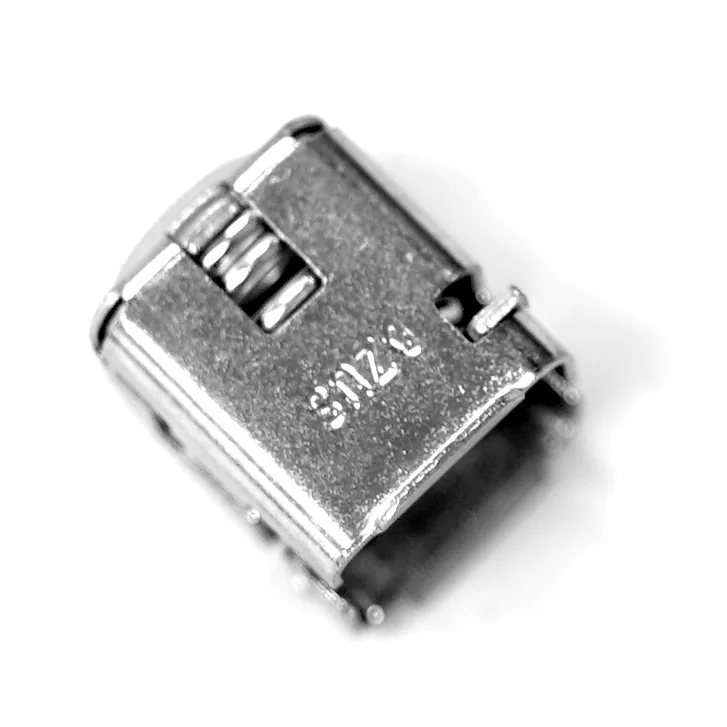 Close-up of the Lelit 9500018 Bianca Body Panel Screw Receptacle, a small metallic component with S128 engraved on its surface, shown against a white background. © 2025 1st-line.com