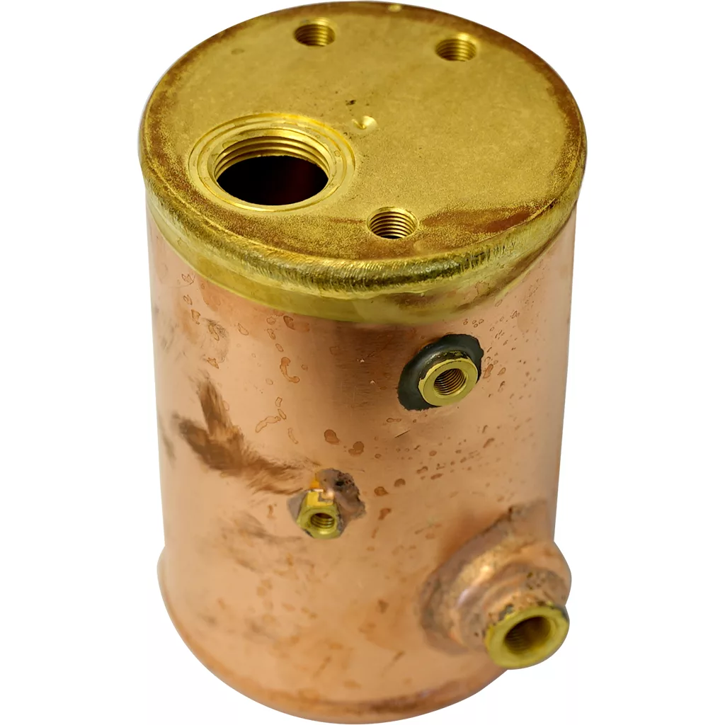 The ECM C277700250 Copper Boiler is a cylindrical unit with a brass top, multiple threaded pipe fittings, and connection ports on its surface, suitable for plumbing or heating systems. © 2025 1st-line.com