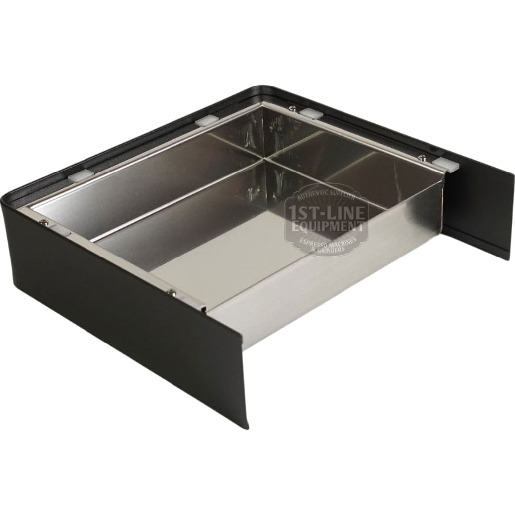 The Lelit 1000246 Black Drip Tray MaraX is a rectangular stainless steel drawer box with black sides, ideal for collecting coffee grounds or waste as a knock box for use with Lelit MaraX espresso machines. © 2025 1st-line.com