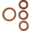 The Ponte Vecchio Grouphead and Piston Gasket Kit includes four brown rubber washers of various sizes, displayed on a white background, with the Grouphead Gasket and three smaller Piston Gaskets arranged side by side. © 2025 1st-line.com
