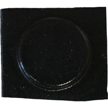 The VBM PIEDDOMSUPFEL Black Non-slip Pad for Foot features a circular raised center and is designed to protect floors from scratches when used as a furniture pad. © 2025 1st-line.com
