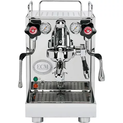 A shiny, stainless steel espresso machine with flow control, two pressure gauges, black knobs, and levers on either side. The ECM logo is visible on the front, along with indicator lights near the base. © 2025 1st-line.com