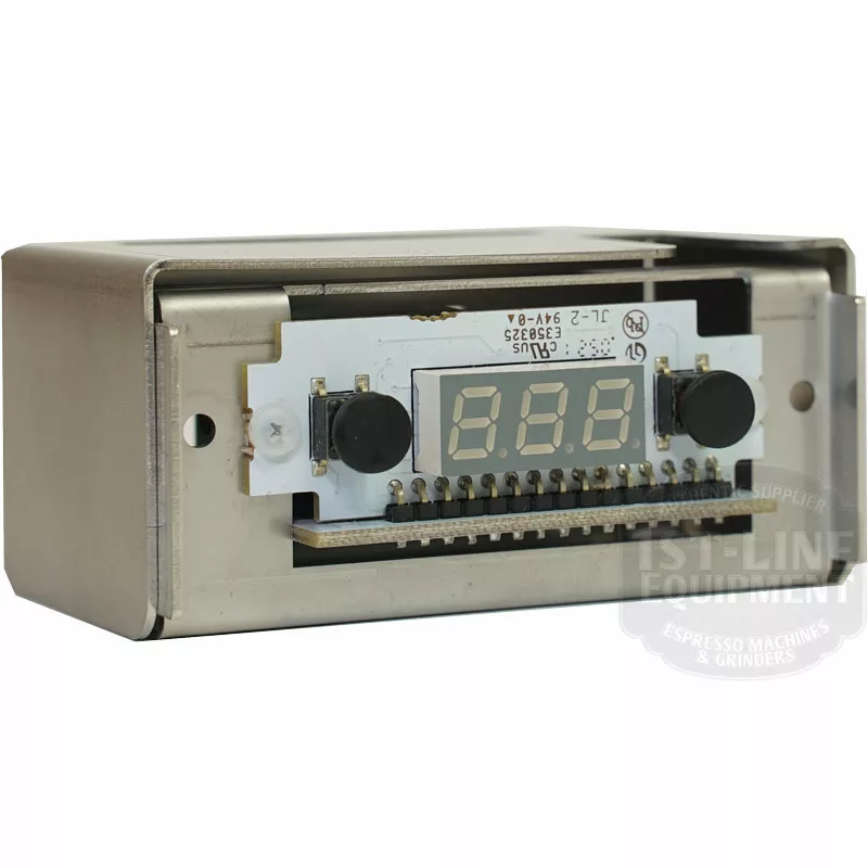 Close-up of the Bezzera 5968142 PID Display 110V, featuring a metal casing, three-digit LED screen, and visible circuit components. The digital timer is angled left and designed for use with 110V systems. © 2025 1st-line.com