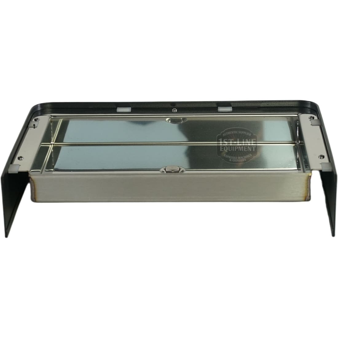 The Lelit 1000256 Black Drip Tray Assembly - Bianca is a rectangular stainless steel tray with a reflective surface, framed in metal with raised edges on three sides, shown at an angle against a white background. © 2025 1st-line.com