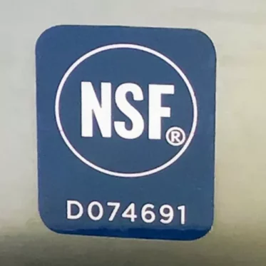 A blue rectangular label for the Faema Faemina Dual Boiler Espresso Machine, featuring NSF in bold white letters inside a circle and the code D074691 below. © 2025 1st-line.com