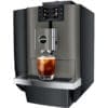 The Jura GIGA 10 Super-Automatic Espresso Machine, with digital controls and a metallic finish, dispenses iced coffee into a clear glass. © 2025 1st-line.com