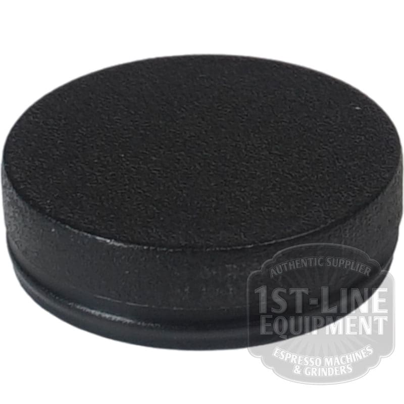 A black, round, textured plastic end cap with a slight lip—ACS MIN0072 Minima Plastic End Cover for Steam Wand Valve—shown on a white background with a faint 1st-Line Equipment watermark in the lower right corner. © 2025 1st-line.com