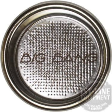 A close-up shows the IMS Big Bang 2-cup Filter Basket 22/24.5 grams D.58 with its name engraved on the metallic, perforated 58mm portafilter surface. © 2025 1st-line.com