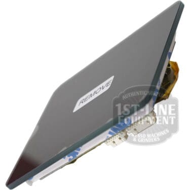 A glossy, rectangular Quamar RMTP00001 Display Board M80/TP with a REMOVE sticker, viewed at an angle and partially revealing its circuit board; compatible with Quamar M80/TP models. © 2025 1st-line.com