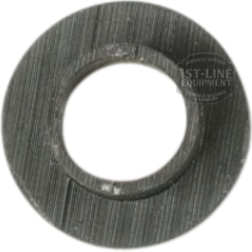 A textured, circular, dark washer with a central hole—seen from above—features faint 1st-Line Equipment text. The VBM BOCCOLANYLON Side Panel Screw Holder is ideal for securely holding VBM side panel screws. © 2025 1st-line.com