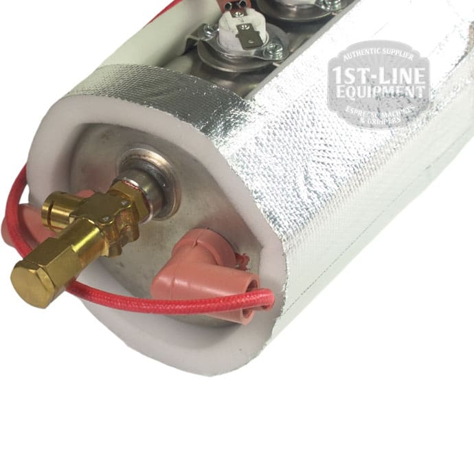 Close-up of a Bellezza BE.040.012 Bellona Steam Boiler Assembly - Version 1 ONLY, wrapped in reflective insulation with red wires, brass fittings, pink plastic parts on one end, and a partially visible 1st-Line Equipment logo. © 2025 1st-line.com