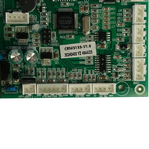 Close-up of a green circuit board, like the Bellezza IN.005.016 Inizio Power Board 110V, featuring multiple components, connectors, and a central white label marked CRM3133-V1.0 20240403 Y2 484AD3. © 2025 1st-line.com