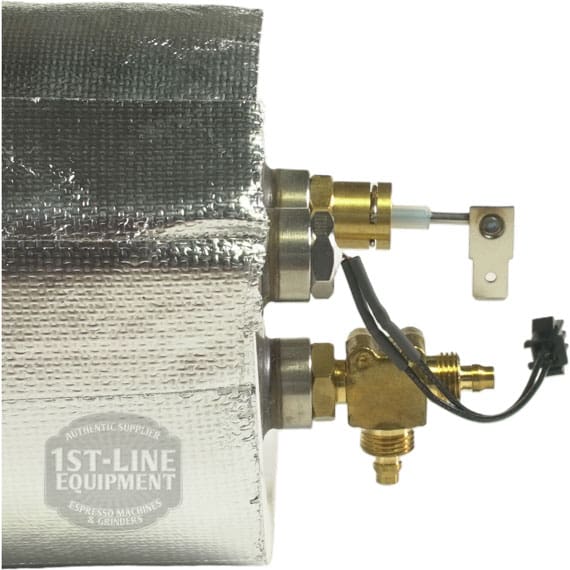 Close-up of a metallic espresso machine part with insulation wrap, brass fittings, and wiring—Bellezza BE.040.012 Bellona Steam Boiler Assembly - Version 1 ONLY—labelled by 1st-Line Equipment Espresso Machines & Grinders. © 2025 1st-line.com