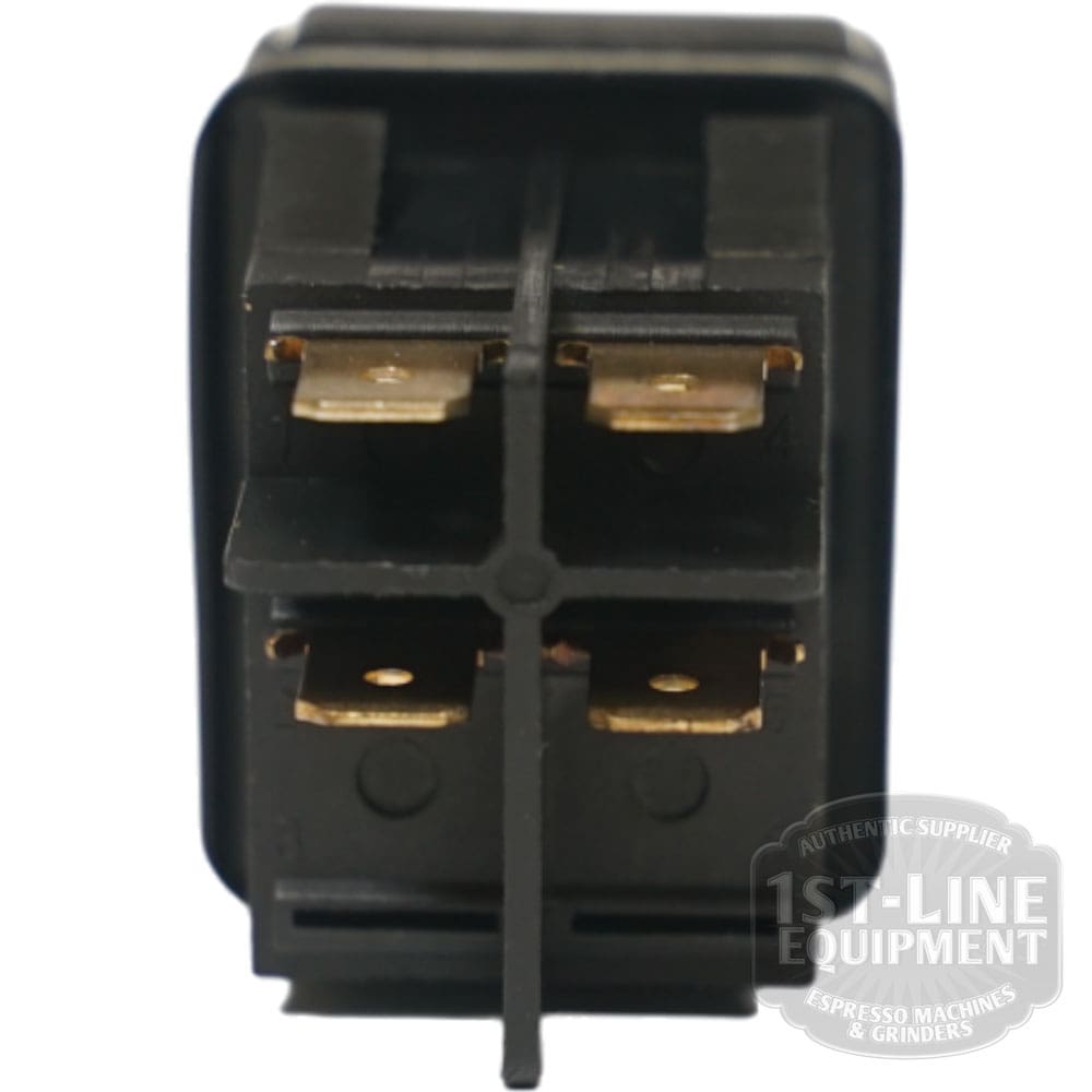 Close-up of the Ascaso V.4299 Switch 250V 16A, a black rectangular switch with four brass terminals on the back. A partial 1st-Line Equipment logo appears in the lower right corner. © 2025 1st-line.com