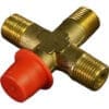 The Bezzera 7304545TR Cross Fitting 1/8 G has brass construction, a cross shape, G-threaded ends, and one end covered by a red plastic cap. © 2025 1st-line.com