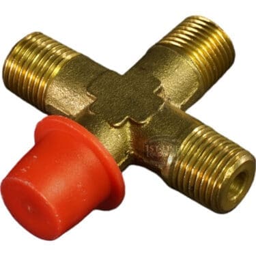 The Bezzera 7304545TR Cross Fitting 1/8 G has brass construction, a cross shape, G-threaded ends, and one end covered by a red plastic cap. © 2025 1st-line.com