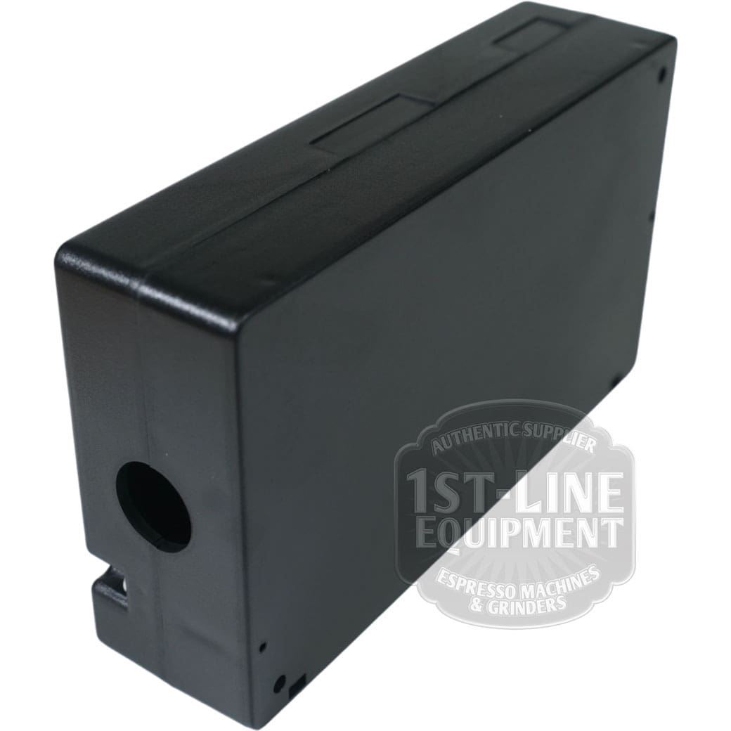 A black rectangular plastic container with a circular hole, shown on a white background, likely serves as an accessory or enclosure for the Torre DOS23001 Control Board 100-240Vac 50/60Hz. © 2025 1st-line.com