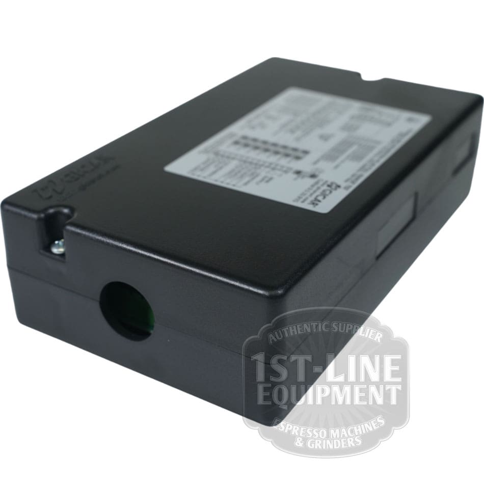 A black rectangular Torre DOS23001 Control Board (100-240Vac 50/60Hz) features a label with technical info on top, a small round opening on one side, and a 1st-Line Equipment watermark in the lower right corner. © 2025 1st-line.com