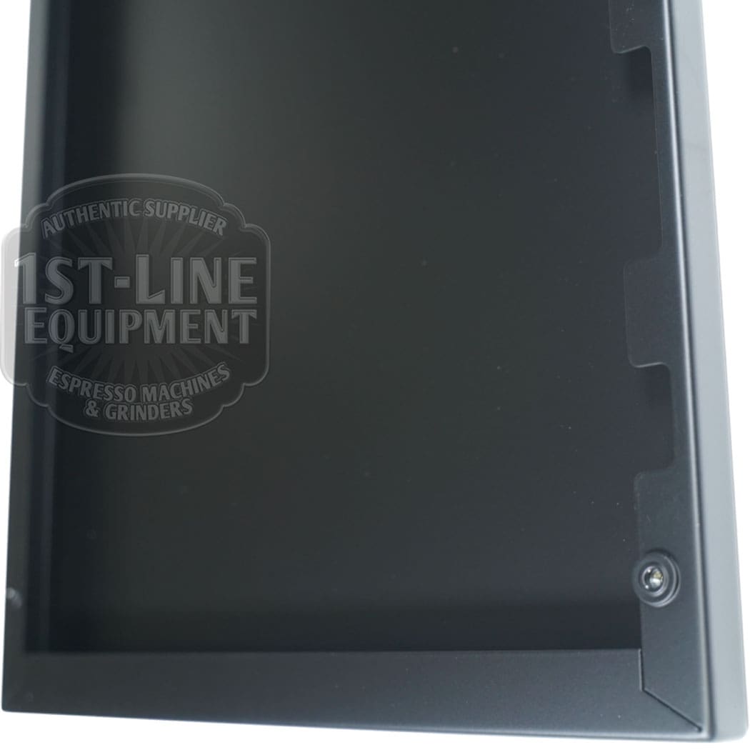 A close-up of the Torre T02FIA002NO Left Side Panel - Matte Black, with a screw in one corner and indented sections on one edge, displayed on a white background. Watermark: 1st-Line Equipment Espresso Machines & Grinders. © 2025 1st-line.com