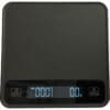 A Eureka Precisa Digital Scale features a black surface, backlit display reading “0.0 g,” and control buttons for Zero and Tare located below the display on the left and right sides. © 2025 1st-line.com