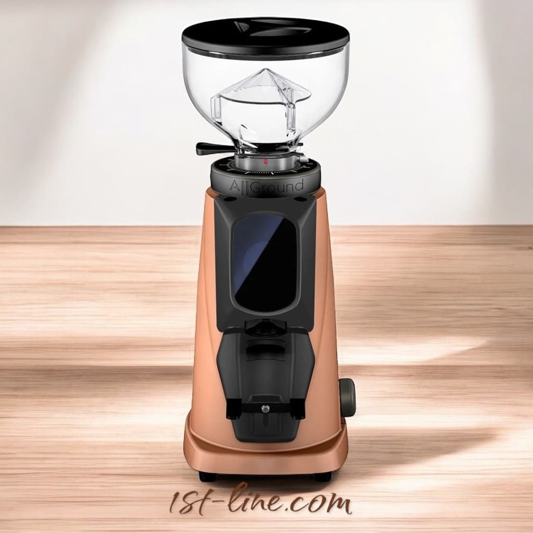A Fiorenzato All Ground Sense Coffee Grinder - Weight-Based Grinding with a transparent hopper and sleek copper-toned base sits on a wooden surface with black accents. The 1st-line.com logo appears at the bottom of the image. © 2025 1st-line.com