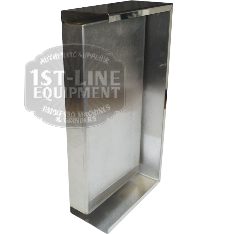A rectangular stainless steel espresso knock box with open top and one raised edge, photographed at an angle beside a Torre T02BAC001 Stainless Steel Drip Tray T02. The 1st-Line Equipment logo watermark is visible on the image. © 2025 1st-line.com