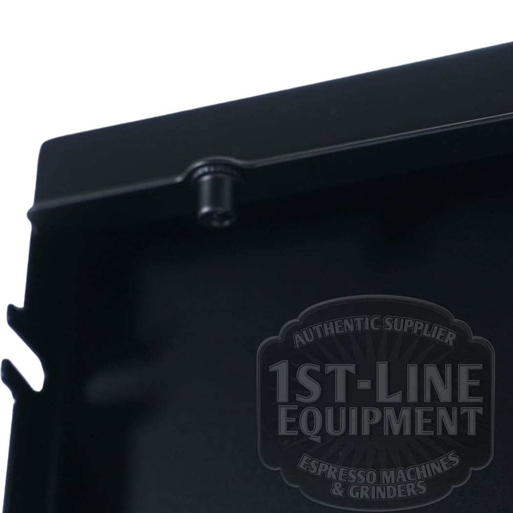 Close-up of a matte black espresso machine part with a small cylindrical peg and the Torre T02POS001NO Back Panel - Matte Black T02, featuring the partially visible 1st-Line Equipment logo in the lower right corner. © 2025 1st-line.com