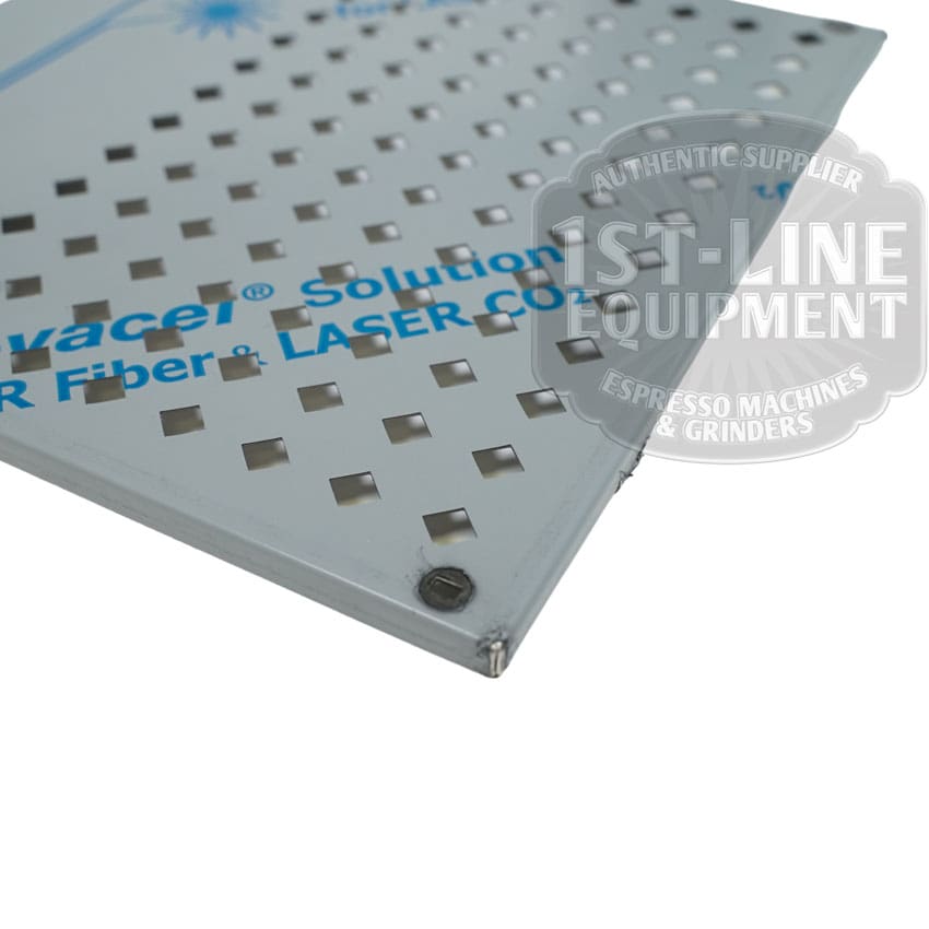 Close-up of a perforated metal drip tray with square holes and blue protective film, the Torre T02SCA003 Cup Warmer T02 logo partly visible—ideal for enhancing your cup warmer setup. © 2025 1st-line.com
