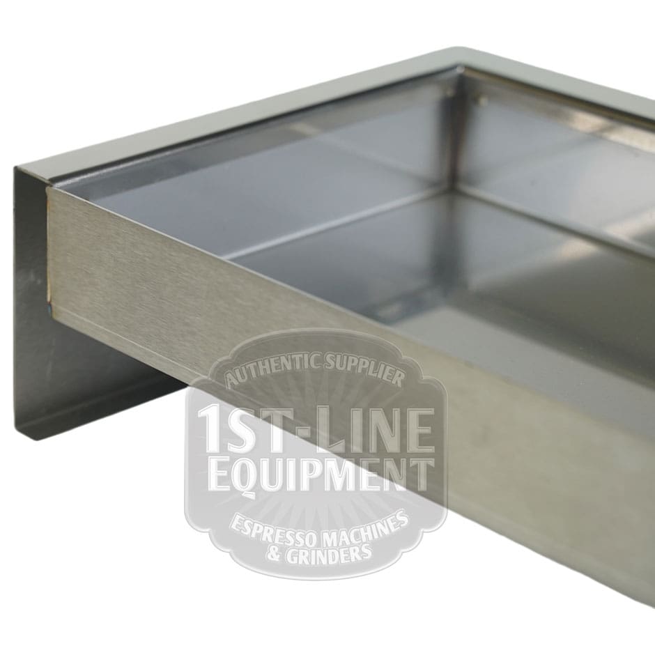 Close-up of a Torre T02BAC001 Stainless Steel Drip Tray T02, featuring a brushed metal edge and a watermark logo reading 1st-Line Equipment, Espresso Machines & Grinders, Authentic Supplier. © 2025 1st-line.com