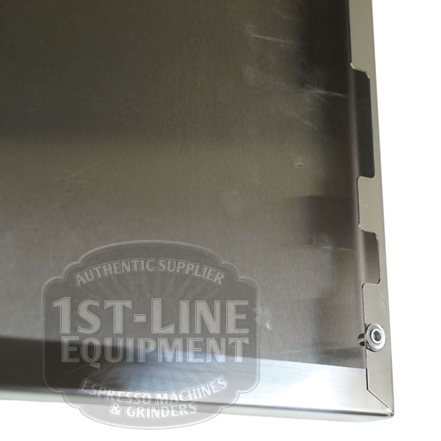 Close-up of the Torre T02FIA002 Left Side Panel - Stainless Steel, showing the drip tray’s cutout slots on the right and the panel at an angle. The 1st-Line Equipment logo watermark appears at the bottom. © 2025 1st-line.com